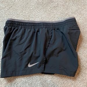 Brand new Nike women’s running shorts dark grey